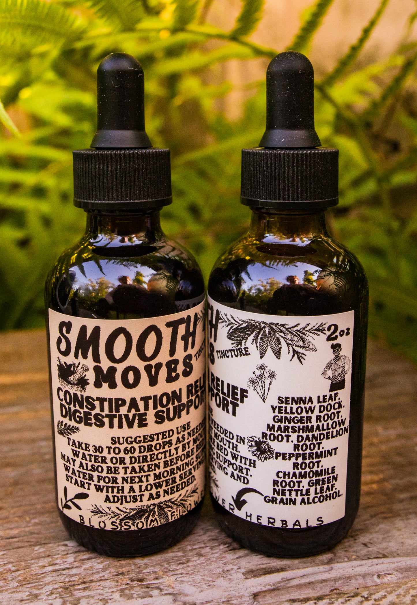 Smooth Moves herbal extract by Blossom Flower Herbals in a 2 oz amber glass bottle for digestive support.
